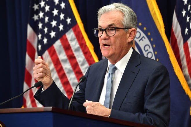 Federal Reserve Chairman Jerome Powell speaks at a press conference.